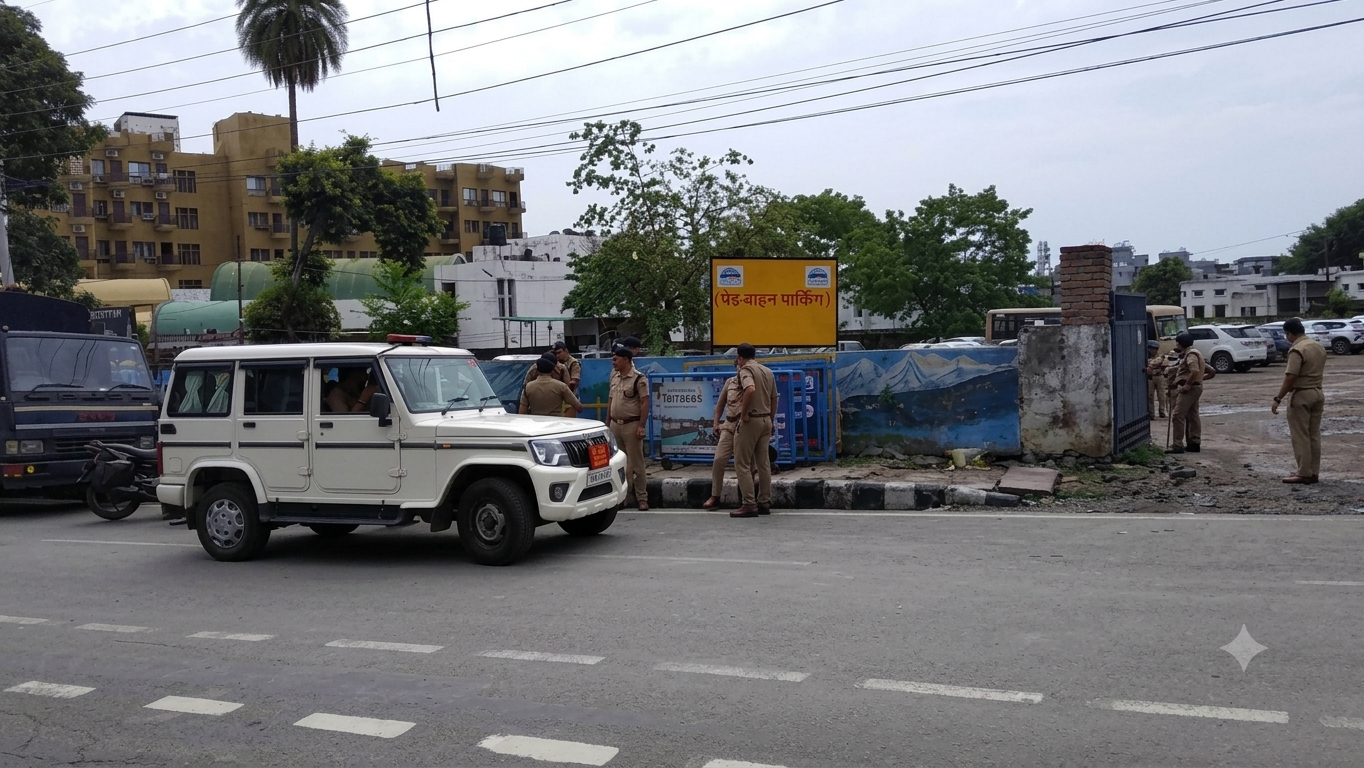 Indian police officers and a Mahindra Bolero police vehicle at a street scene in Mussoorie.