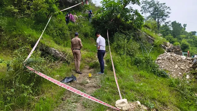 Police personnel investigating the Bageshwar Principal Murder Case at PM Shri Government Inter College Bhatkhola in Bageshwar, Uttarakhand.