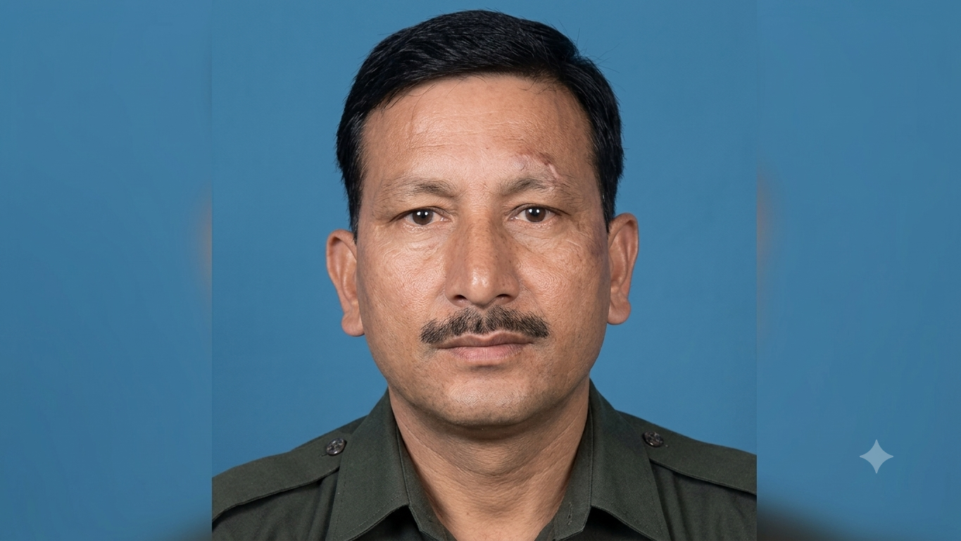 Portrait of late DSC soldier Mahendra Singh from Bageshwar, Uttarakhand, wearing an Indian military uniform against a blue background.