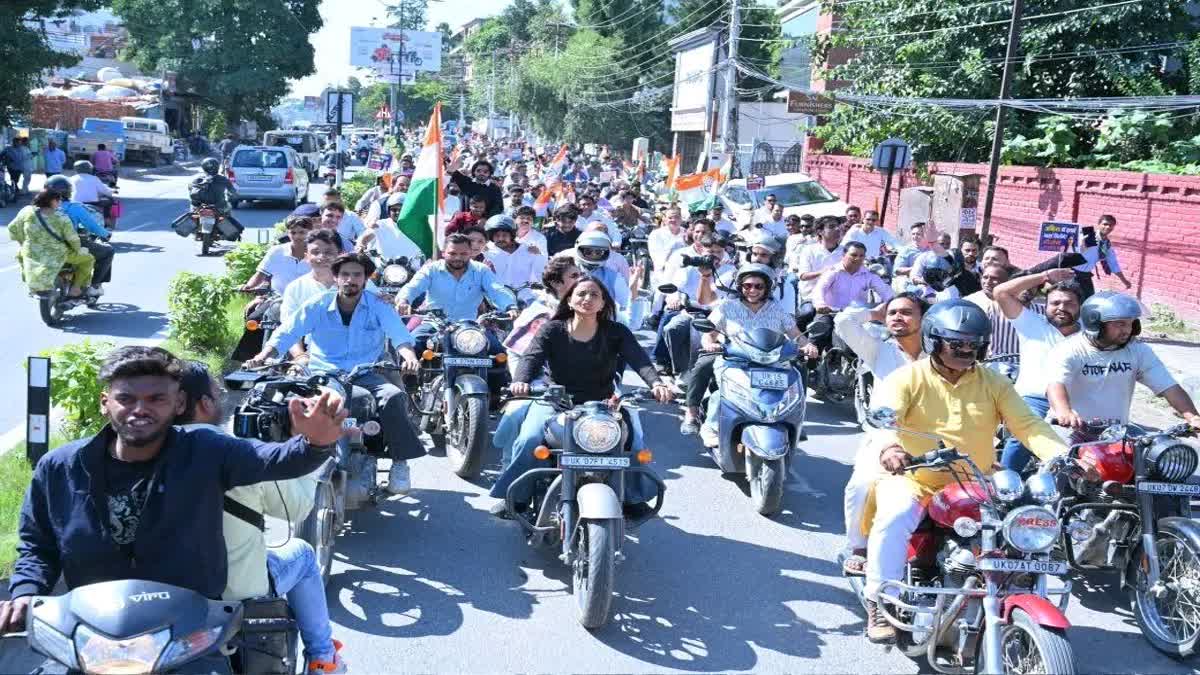 Congress leaders and party workers hold a bike rally in Dehradun demanding justice in the Ankita Bhandari murder case and an investigation into the alleged VIP connection.